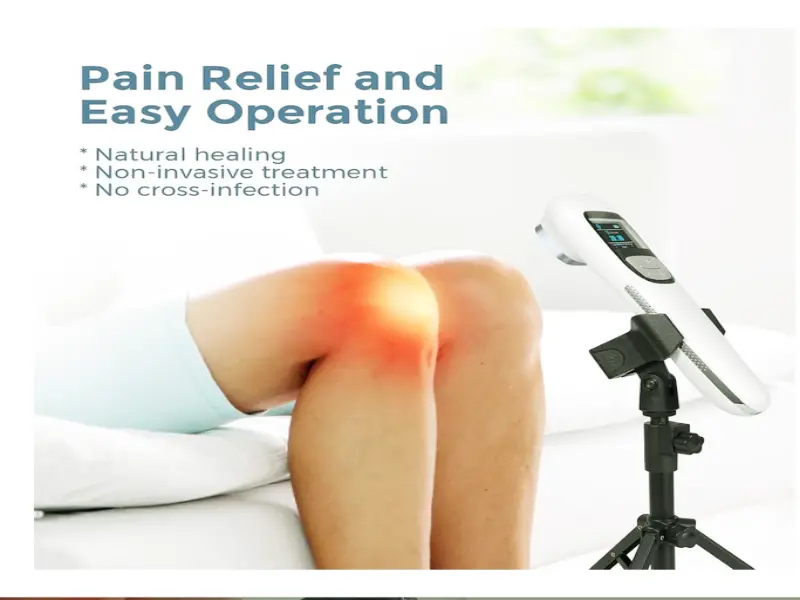 A person using the SINORIKO handheld cold laser device at home to treat joint inflammation and diabetic neuropathy.