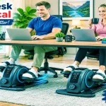 A middle-aged American woman sitting comfortably in a well-decorated living room, practicing safe home cardio using a Cubii under desk elliptical exerciser.