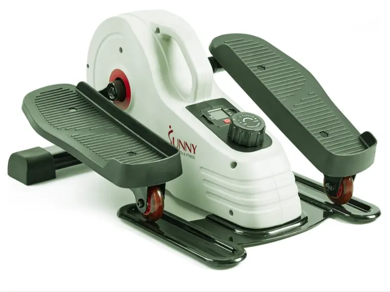 Under-desk elliptical trainer used for blood circulation and diabetes management at work.