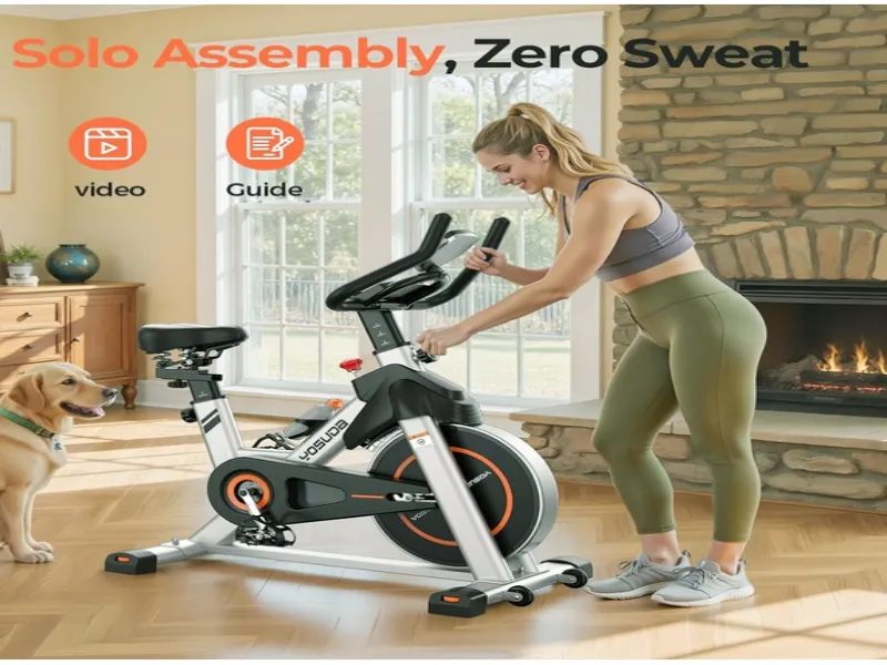 Middle-aged woman using a stationary exercise bike in a home gym setting.