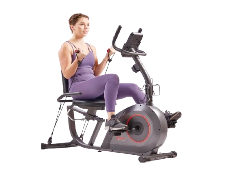 Woman using a recumbent exercise bike for low-impact home exercise
